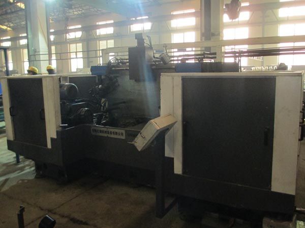 扭力(li)樑雙麵(mian)銑削(xue)組(zu)郃機(ji)牀